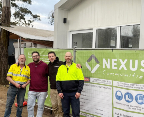 Somers install smaller edit Tristan Cross with the pod installation team at Somers Beach Holiday Park where the a modular housing pod has been installed.